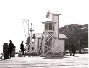 Immigration Station bell & light located at the end of the pier.