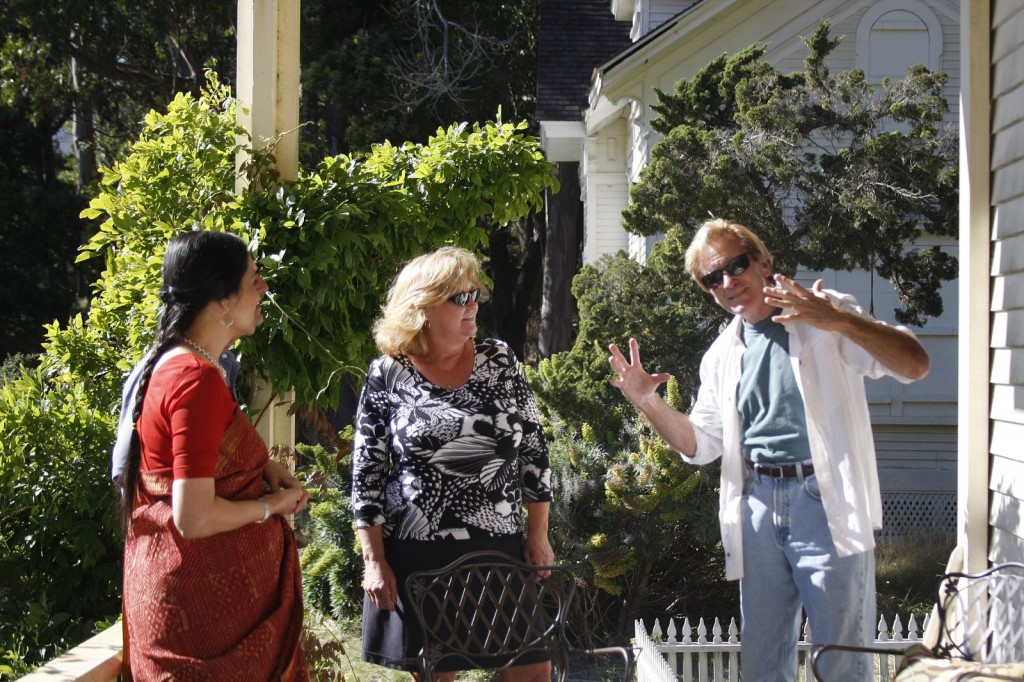 Sudha Pennathur and Peggy Duggan taking in a tale by Doug McConnell.